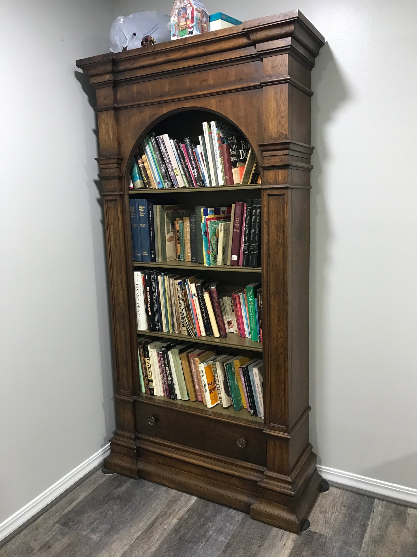 Vintage Drexel wood bookcase with arched top and drawer