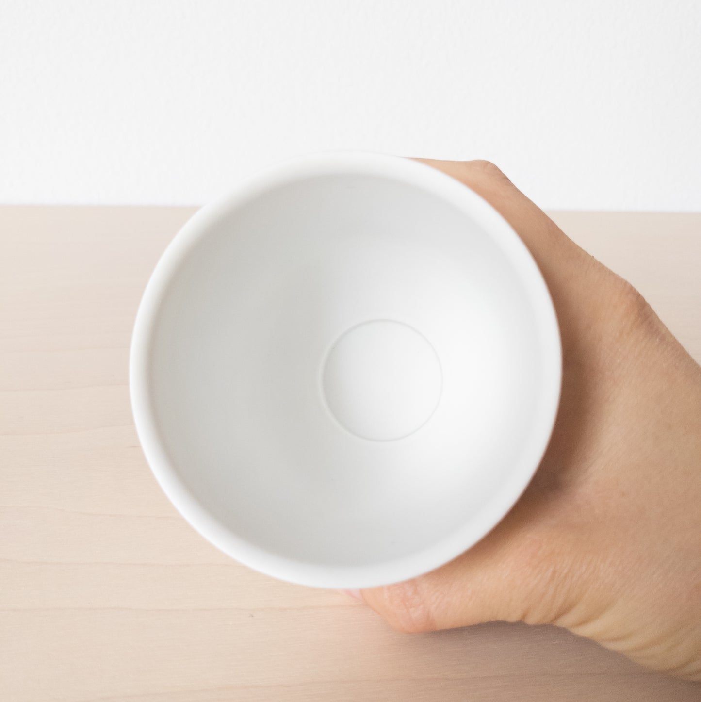 Small Matte White Porcelain Cup with Sailboat Relief