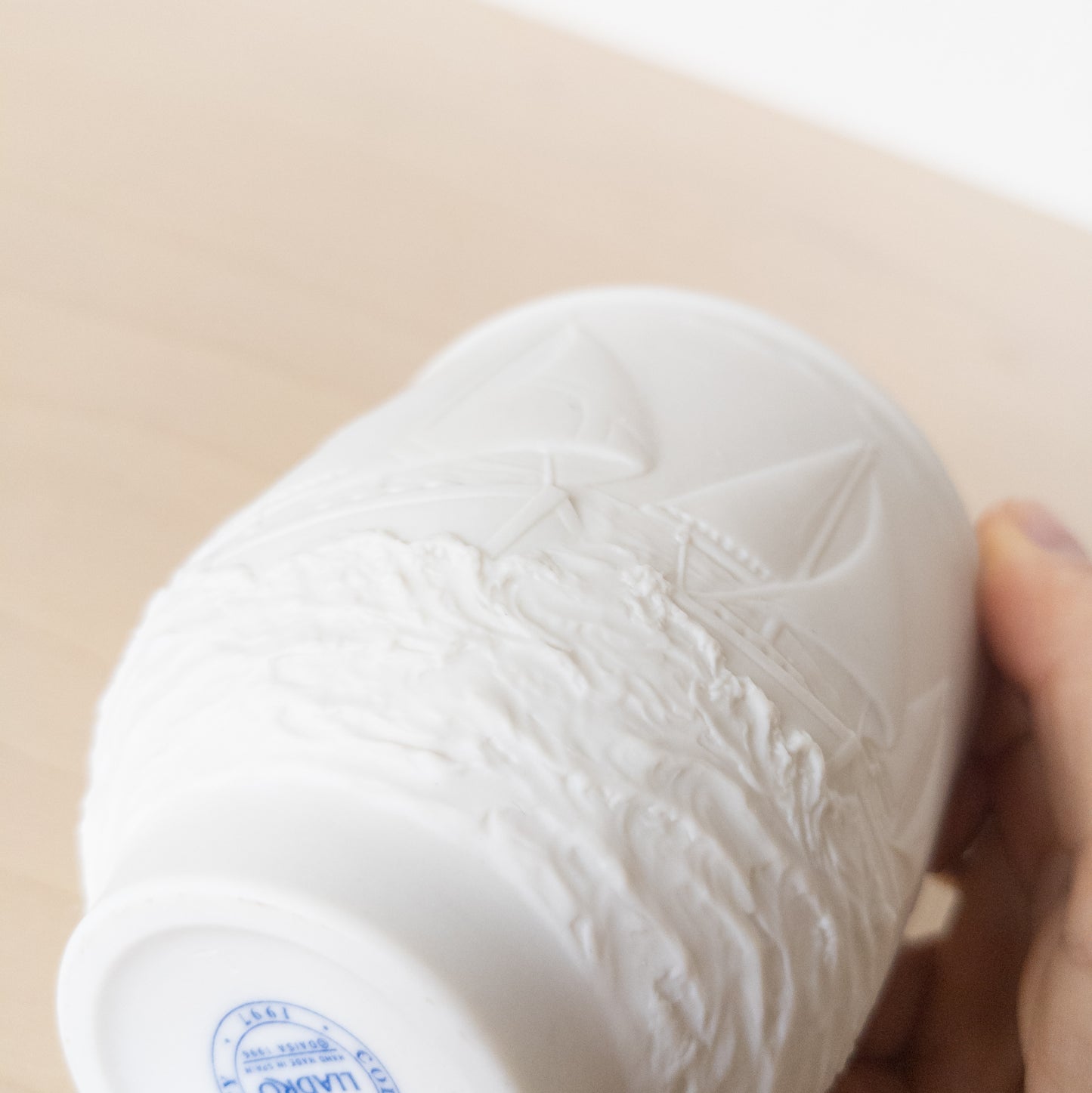 Small Matte White Porcelain Cup with Sailboat Relief