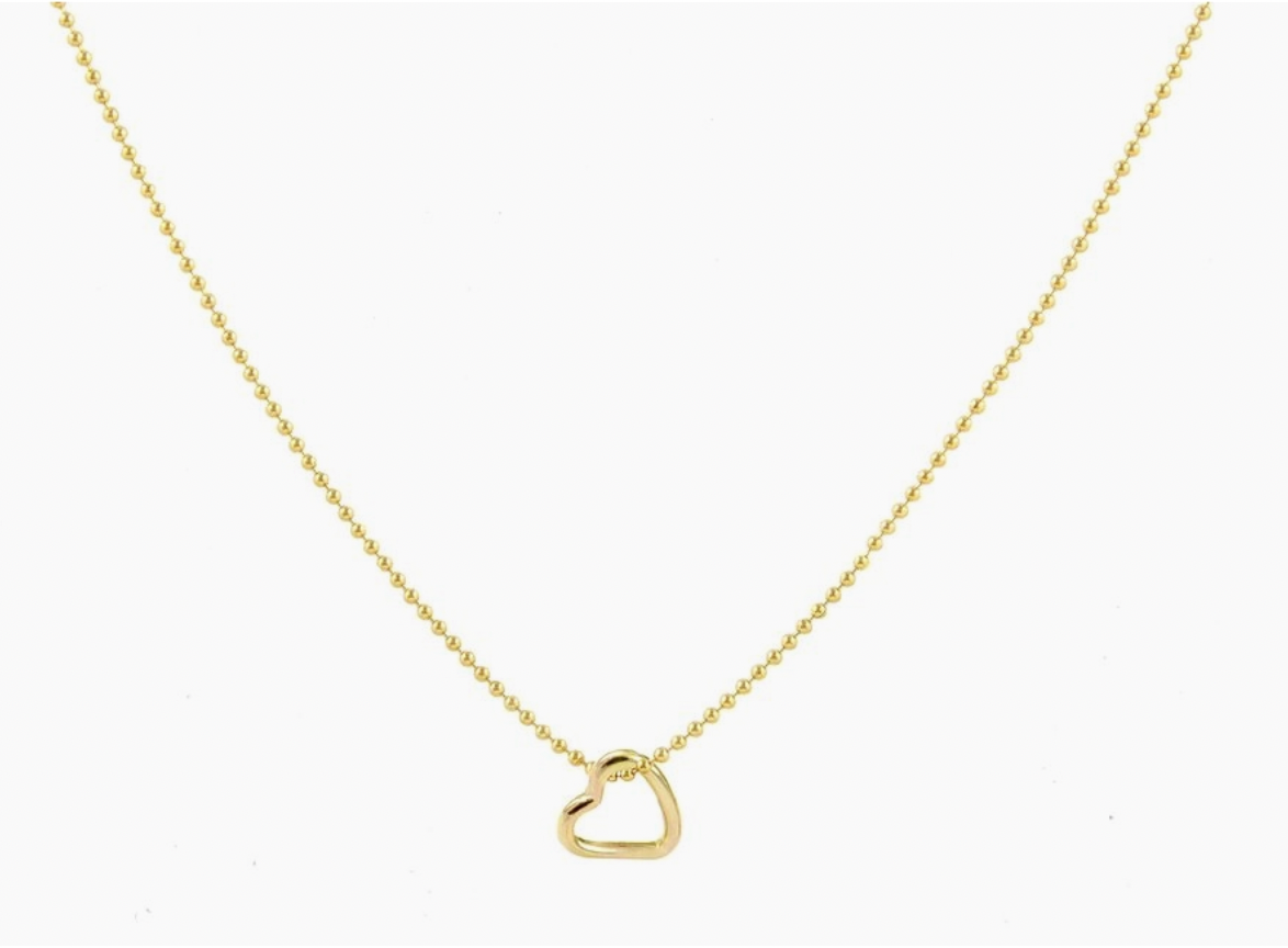 Sweet and simple, this necklace is one of our favorite every day wears. So perfect and comfortable we never want to take it off! Handmade mini heart pendant on a super delicate ball chain, available in 16" and 18" chain lengths.