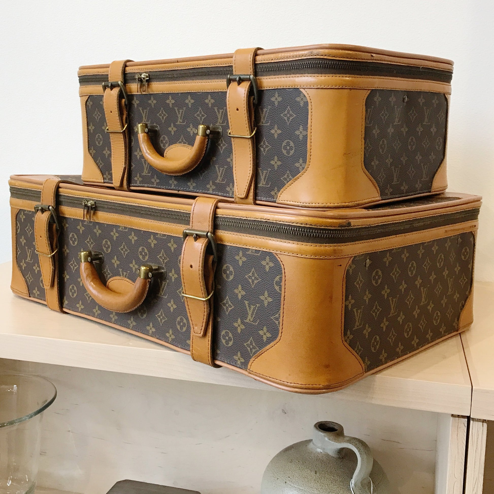 Lot - A VINTAGE LOUIS VUITTON SOFTSIDED SUITCASE, AMERICAN, 1970s
